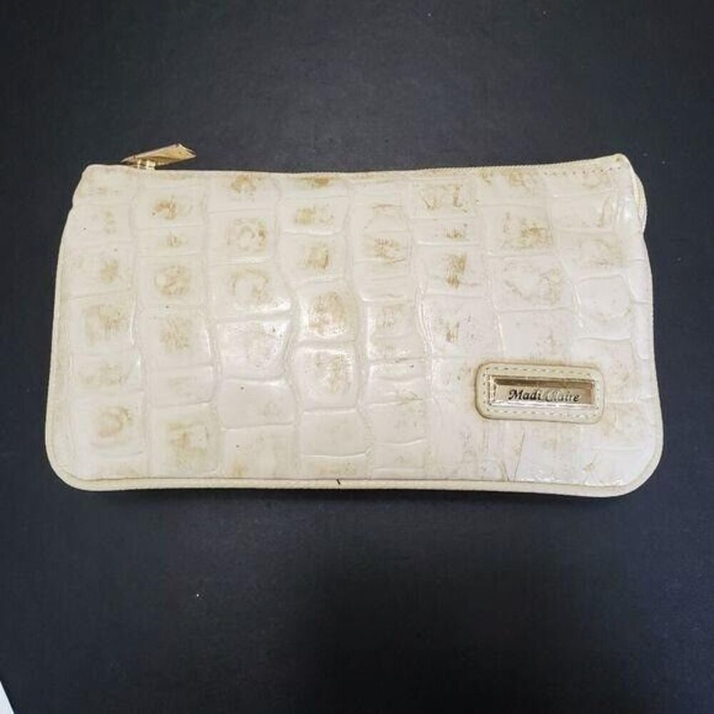 Madi Claire cream colored leather crossbody bag